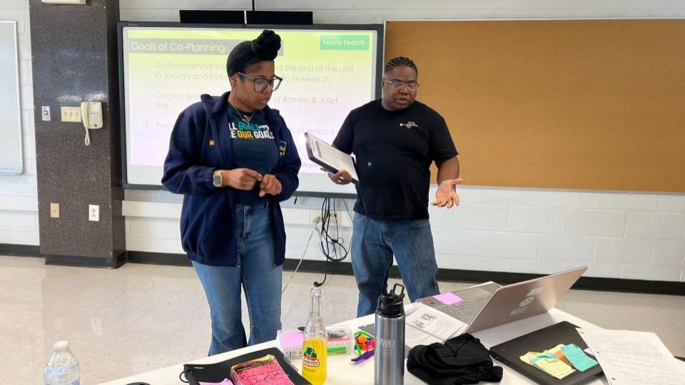 Two teachers collaborate in a classroom at Green Dot Public Schools CA